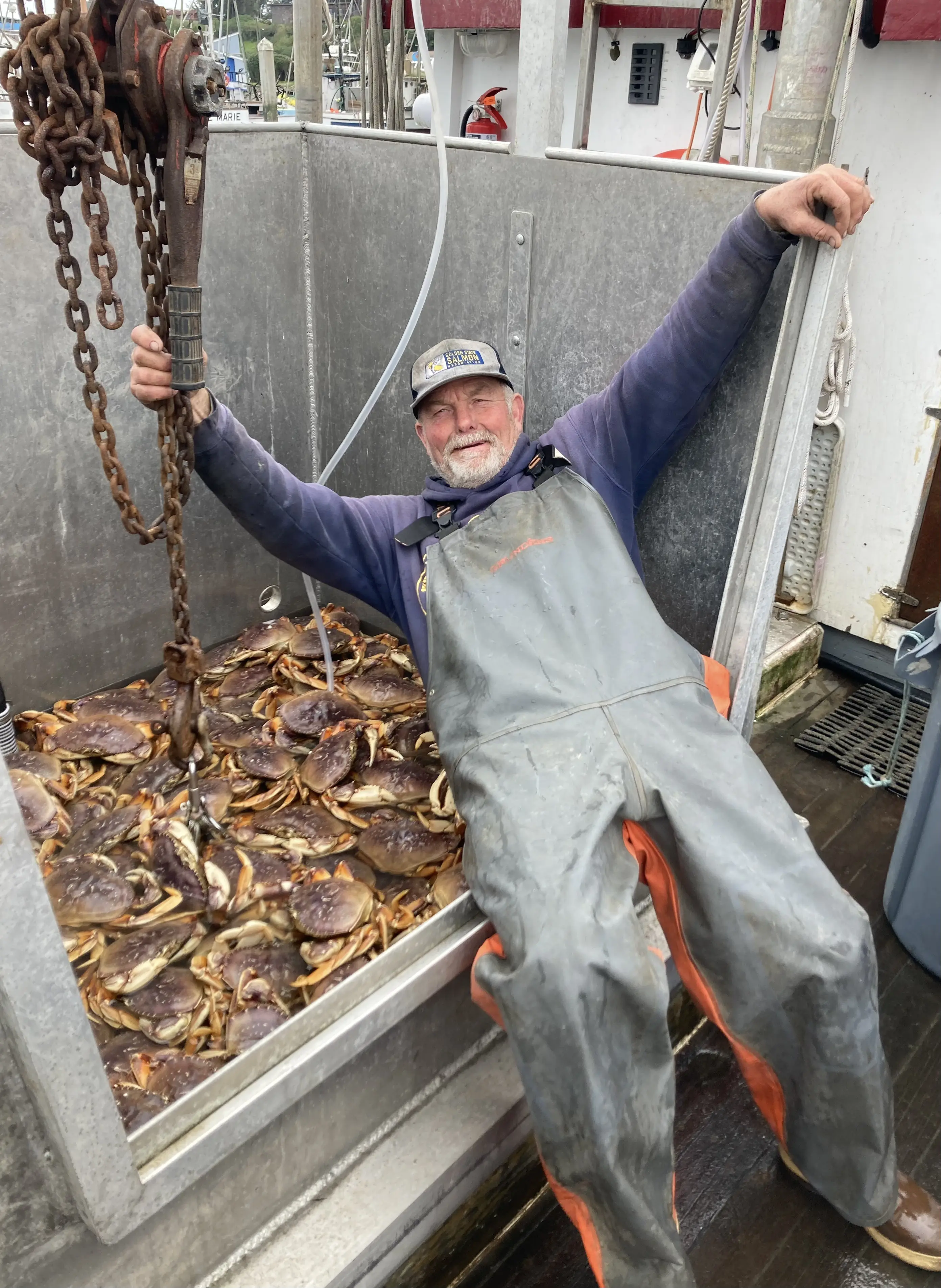 Captain with fresh Dungeness Crab